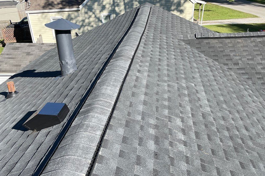 Efficient GAF shingles on a suburban roof in Springfield, IL.